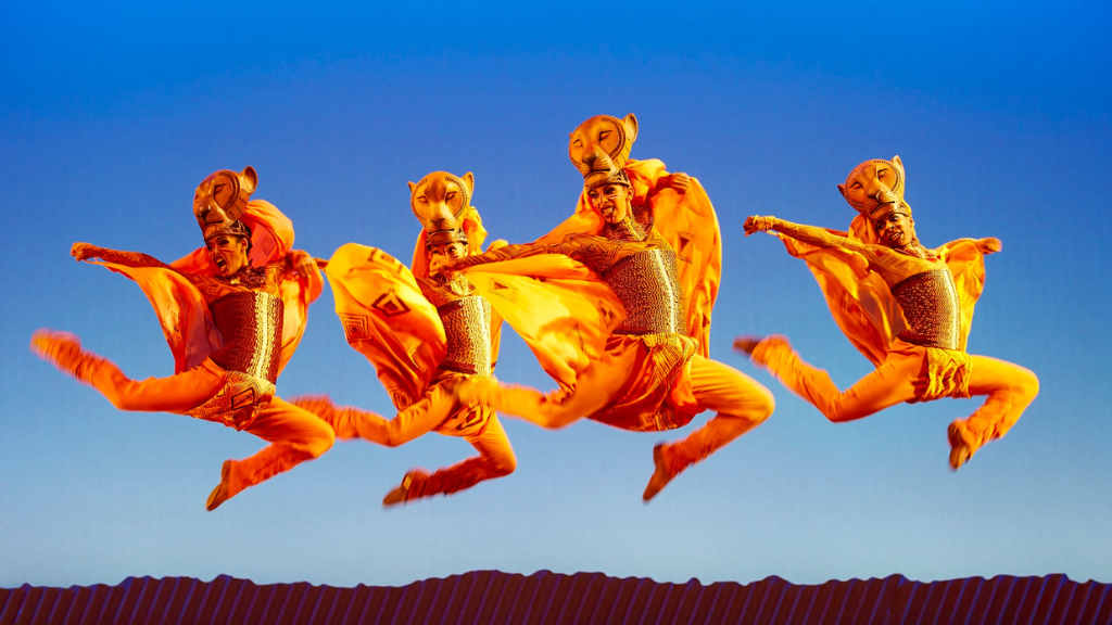 jumping dancers, lion king, dressed in savannah outfits, costume, musical comedy, paris theatre, paris